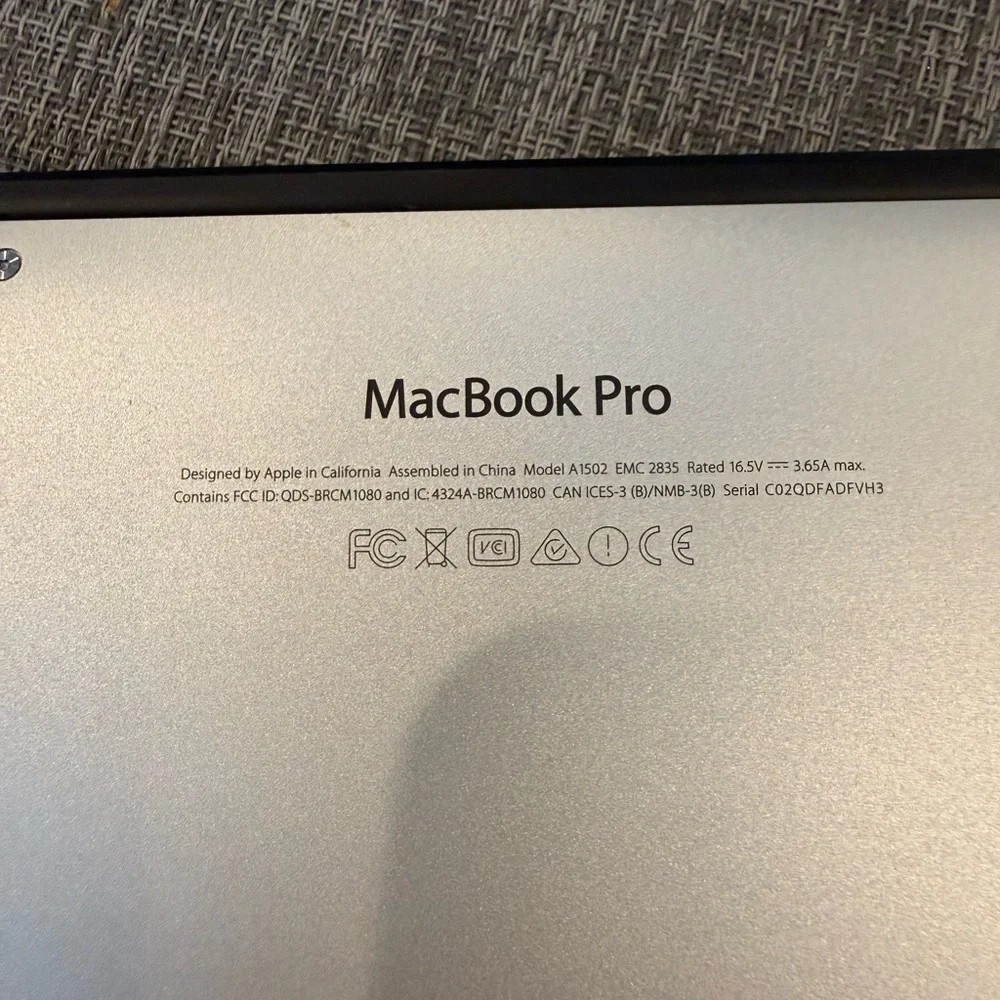 Apple Silver MacBook Pro with Black Keyboard